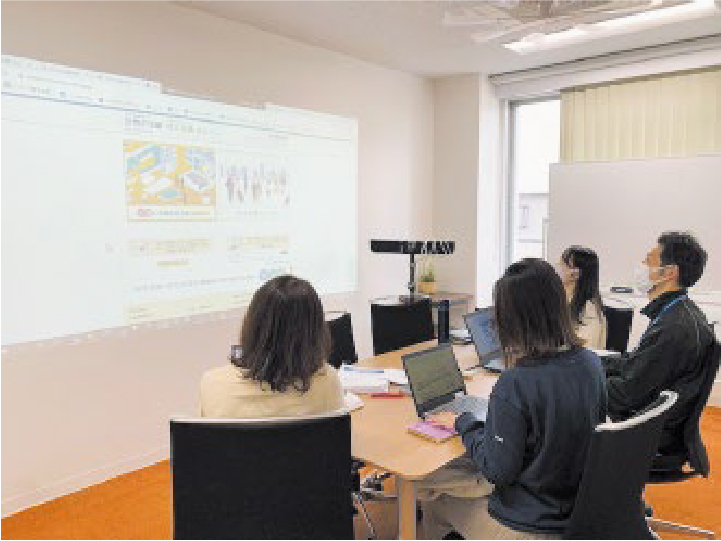 Women's empowerment project members holding a meeting